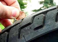 You can use a penny to check your tire depth